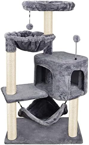 YUNIQUE Cat Tree with Cat Condo and Big Hammock — shown in a real home setting for scale