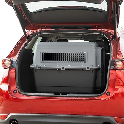 SportPet Airline Compliant X-LARGE 32.25" Travel Dog — shown in a real home setting for scale